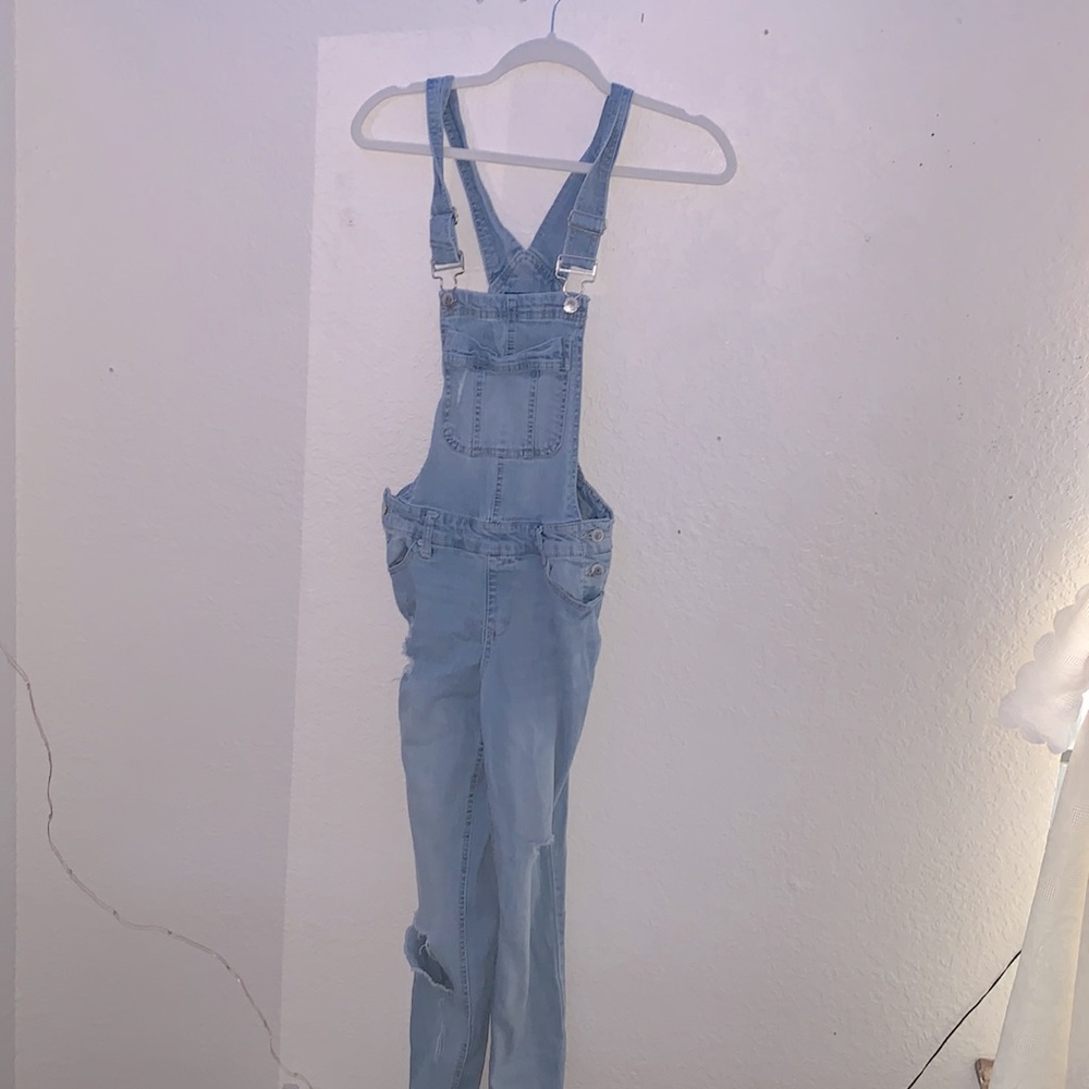 ripped overalls